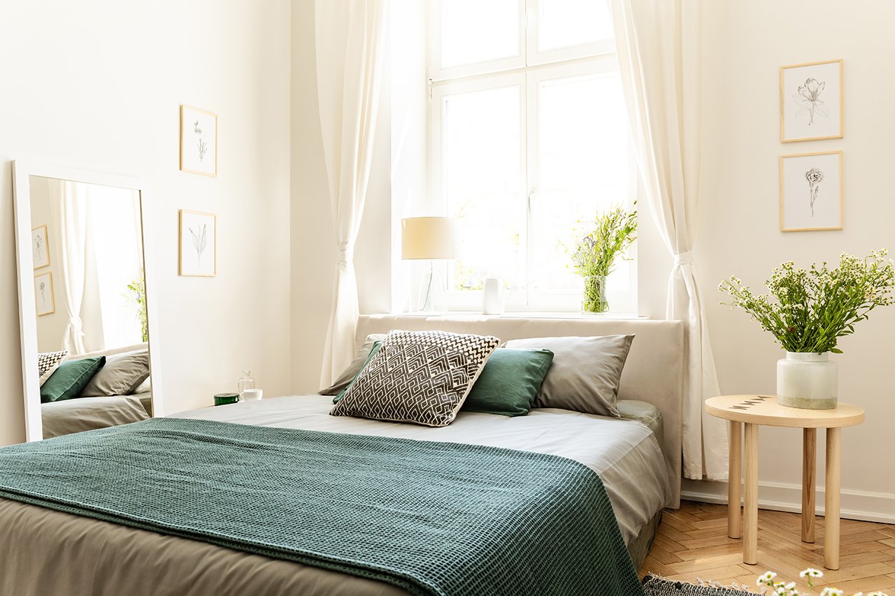 Eco-cotton-linen-and-blanket-on-a-bed-in-nature-loving-family-guesthouse-for-spring-and-summer-vacation.